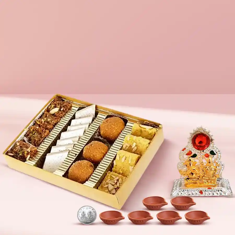 Special Diwali Gifts and Sweets Box featuring Laxmi Ganesh Mandap, assorted sweets, silver-plated coin, and decorative diyas