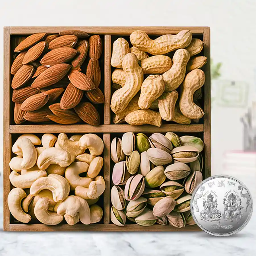 Marvellous Wooden Tray filled with premium salted dry fruits and a silver-plated Ganesh Lakshmi coin for Diwali celebration.