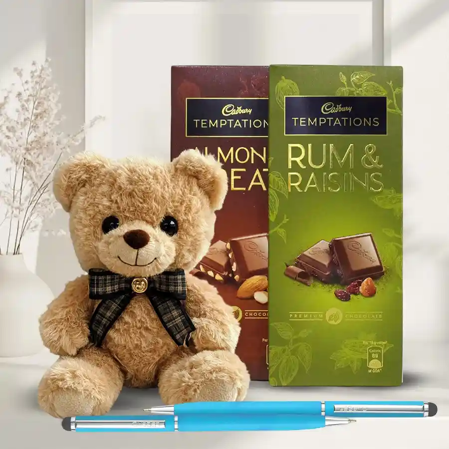 Cadbury Temptations N Teddy Combo featuring two chocolate bars, a 9-inch teddy bear, and two ballpoint pens arranged together.