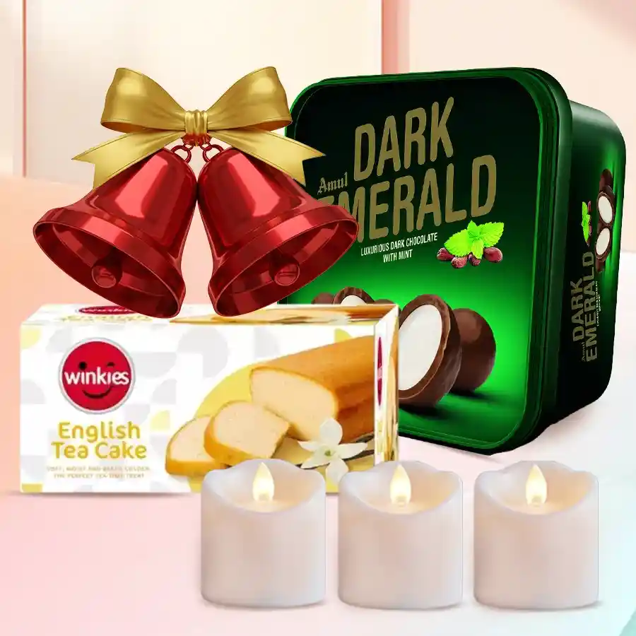 Remarkable Xmas Chocos N Assortments Gift Combo featuring Amul Dark Emerald Luxury Chocolates, Winkies English Tea Cake, smokeless LED candles, and Christmas bells.