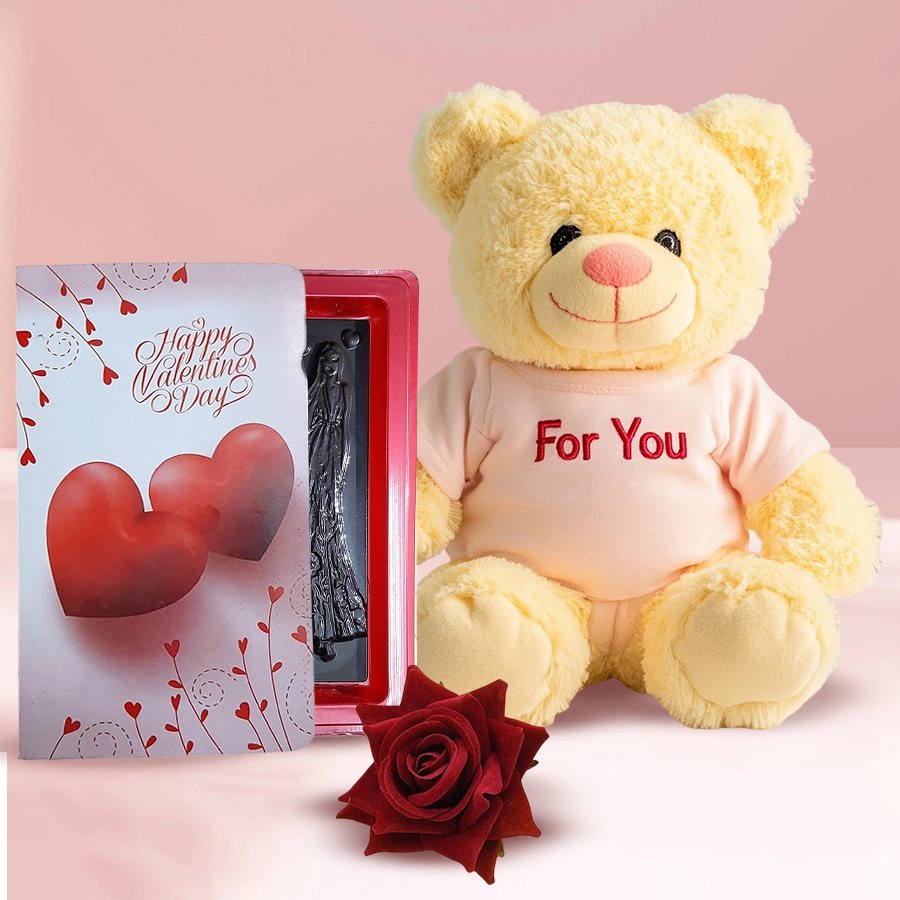 Ravishing Valentine's Day gift combo featuring a 40cm teddy bear, a red velvet rose, and Love Book Chocolates