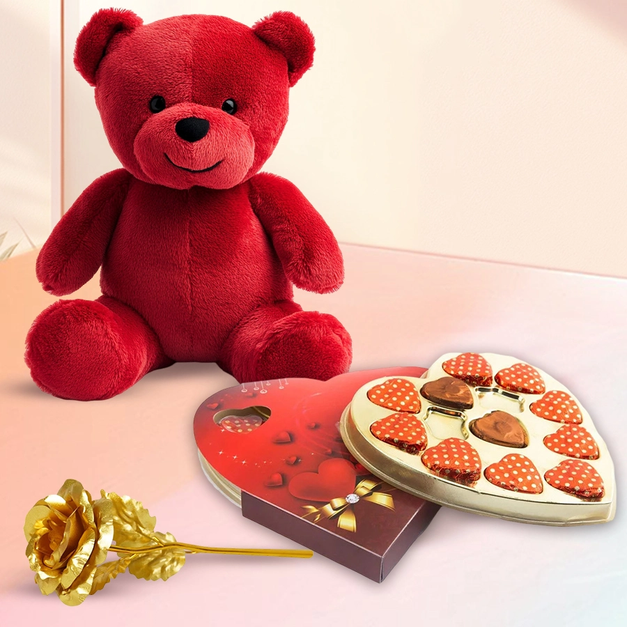 A soft red teddy bear, eleven heart-shaped chocolates, and a golden rose arranged together as a romantic gift for Propose Day.