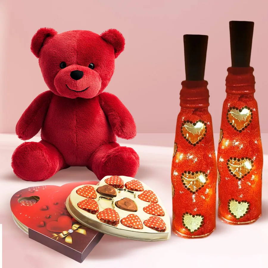 Valentine's Day gift combo featuring a Twin Heart LED lamp, heart-shaped chocolates, a 6-inch teddy bear, and a red velvet rose