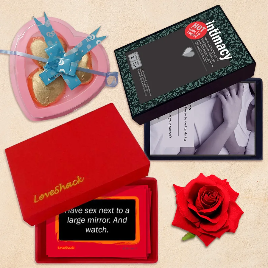 Fun Time Adult Game Duo with heart-shaped chocolates and a red velvet rose for Valentine's Day.