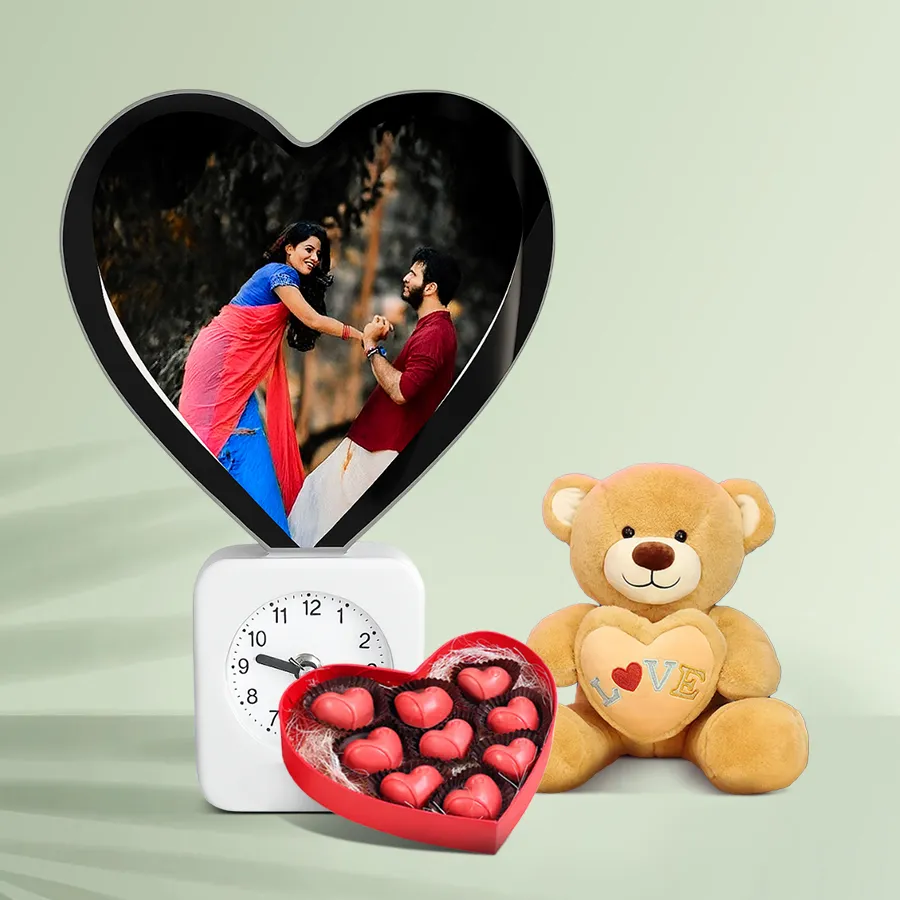 Happy Birthday Personalized Gift Combo featuring a Magic Heart Lamp Clock, heart-shaped chocolates, and a teddy bear.