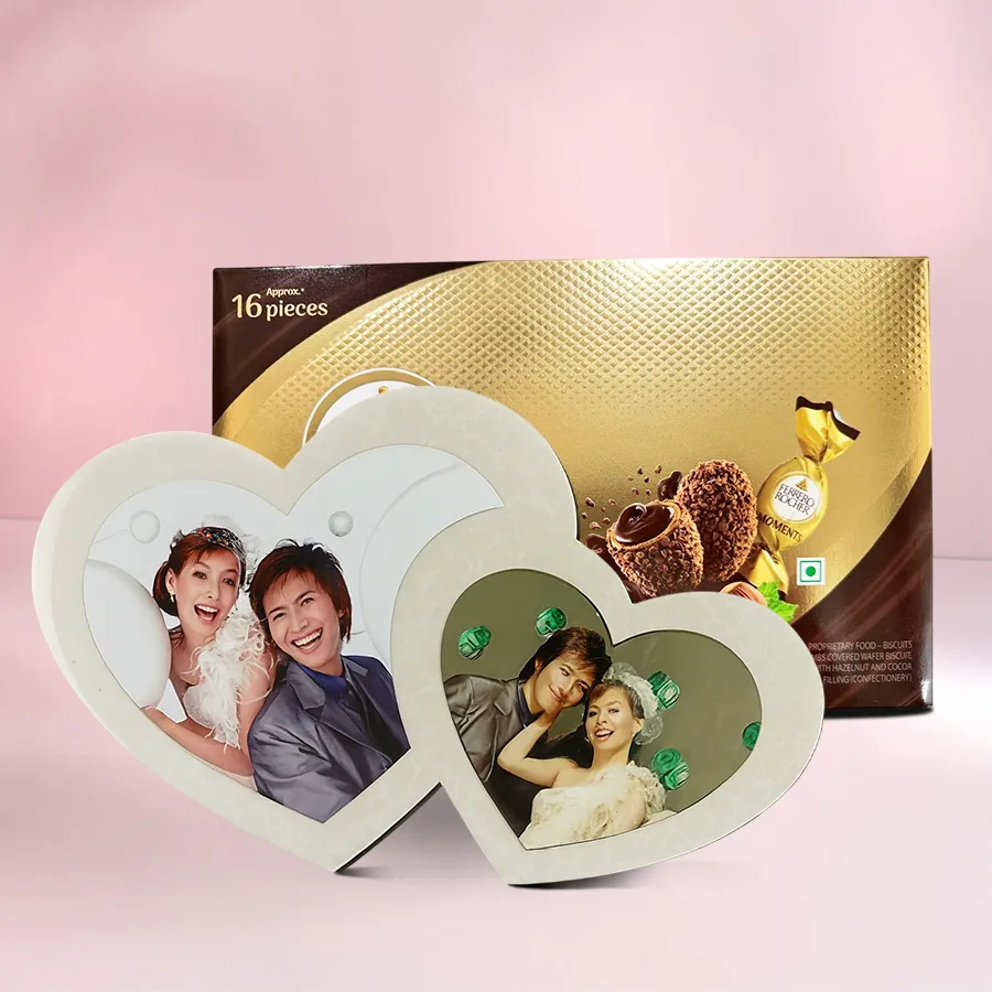 Exclusive Twin Heart Personalized Photo Frame with a photo, alongside a box of Ferrero Rocher chocolates.