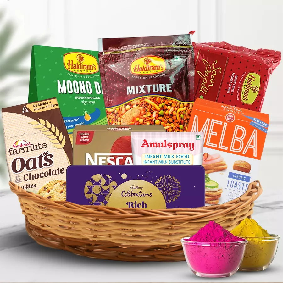 Outstanding Holi gift basket filled with assorted festive treats like Nescafé cappuccino, Amul spray milk, Melba toast, Sunfeast chocolate cookies, Haldiram masala mixtures, sohan papdi, Cadbury dry fruits, and colorful herbal gulal packets, all elegantly arranged in a charming basket.