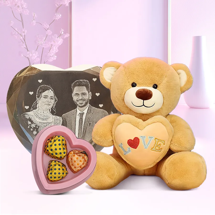 Personalized heart-shaped crystal with a custom photo, three heart-shaped chocolates, and a 9-inch teddy bear holding an "I Love You" heart.