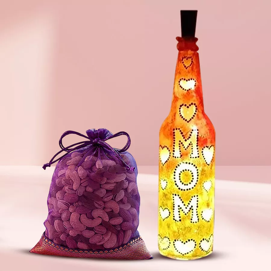 Handcrafted LED bottle lamp with Mandala art and "MOM" design, paired with a potli of assorted dry fruits