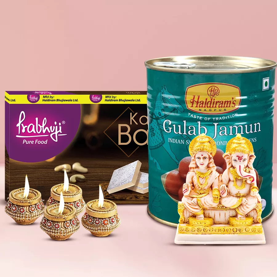 Magical Deepavali Pack with Haldirams sweets, earthen diyas, and a Laxmi Ganesh idol.