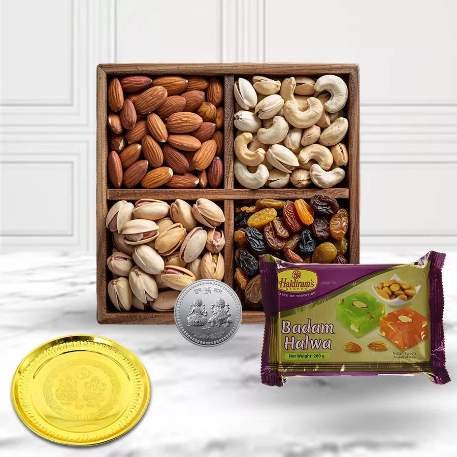 Blissful Gift of Dry Fruits with Puja Thali, featuring cashews, almonds, raisins, pistachios, Badam Karachi Halwa, golden-plated thali, and Laxmi Ganesh silver coin