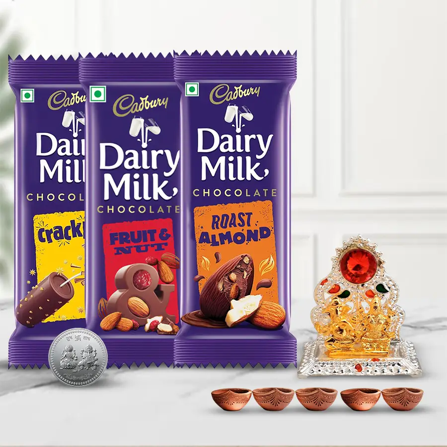Deepavali gift pack featuring Cadbury chocolates, Laxmi Ganesh Mandap, 5 diyas, and a free coin