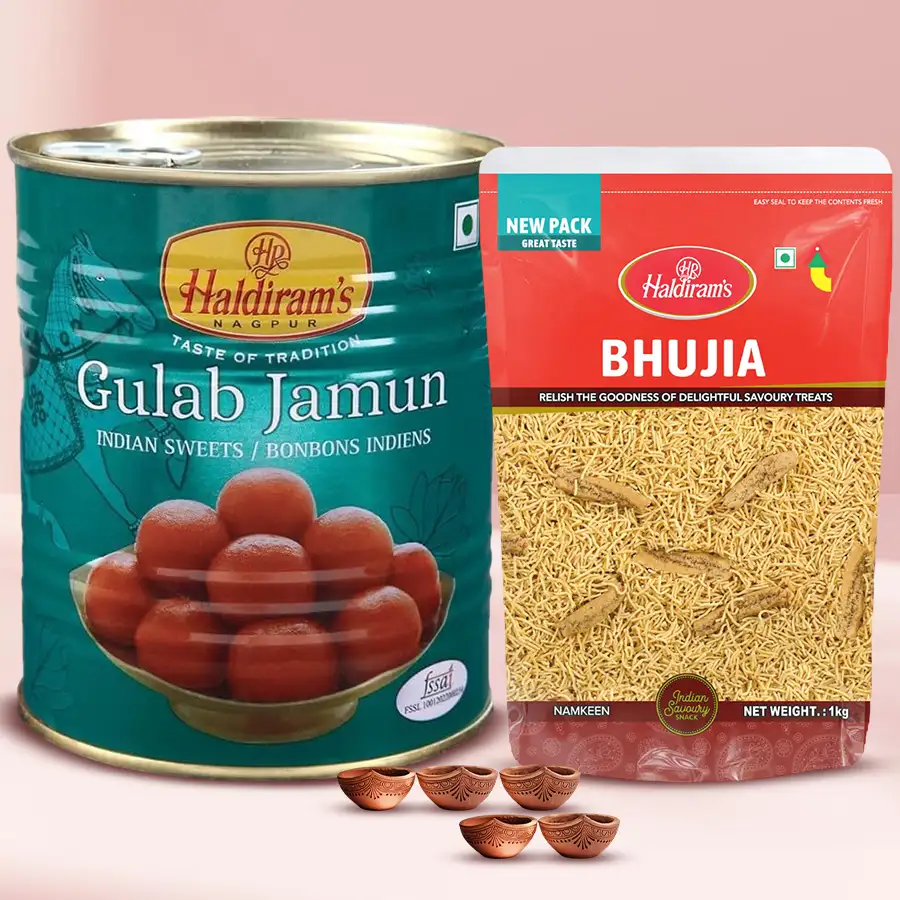 Joyful Diwali gift pack featuring Haldiram Gulabjamun, crunchy Bhujiya, and elegant mud Diyas