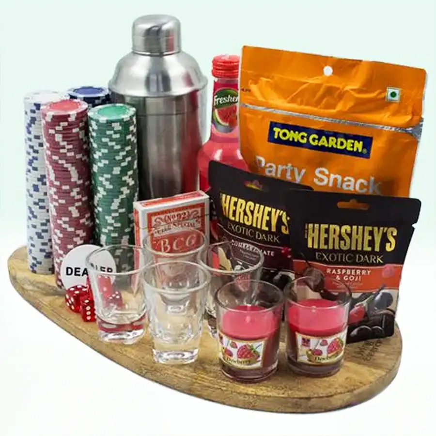 Smashing Diwali Evening Gift Combo featuring shot glasses, cocktail shaker, mocktail mix, snacks, poker game set, Hershey's dark chocolates, and candles