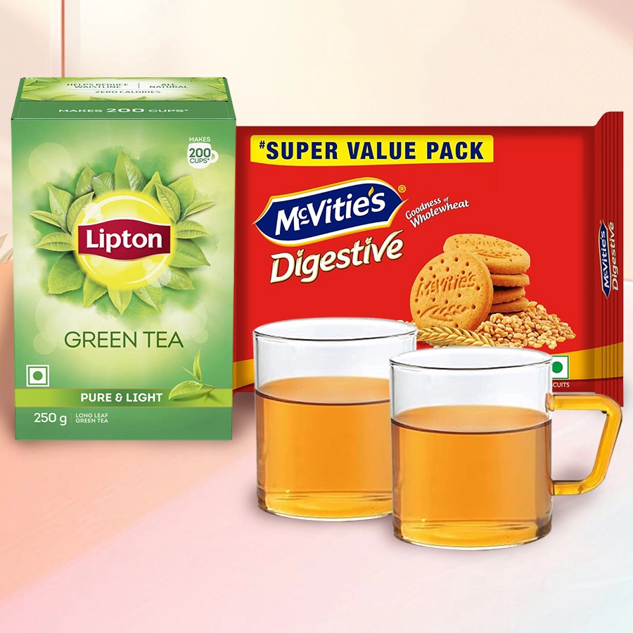 Superb Xmas Tea Hamper with Borosil Cups, featuring Loose Green Tea, elegant mugs, and McVitie’s biscuits