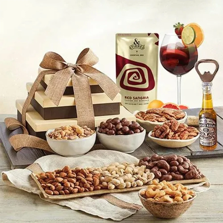 Quirky Xmas Gift Tower featuring dried nuts, Red Sangria Cocktail Mix, wine bottle opener, and two wine glasses