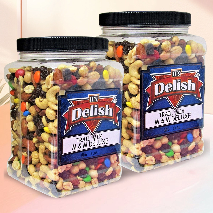 Twin jars of trail mix and candies tied with festive ribbons, filled with colorful M&M's and crunchy trail mix.