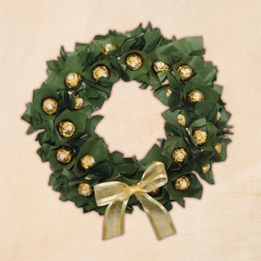 Ecstatic Handmade Chocolate Wreath featuring 24 rich, handcrafted chocolates arranged in a festive design for Christmas gifting.