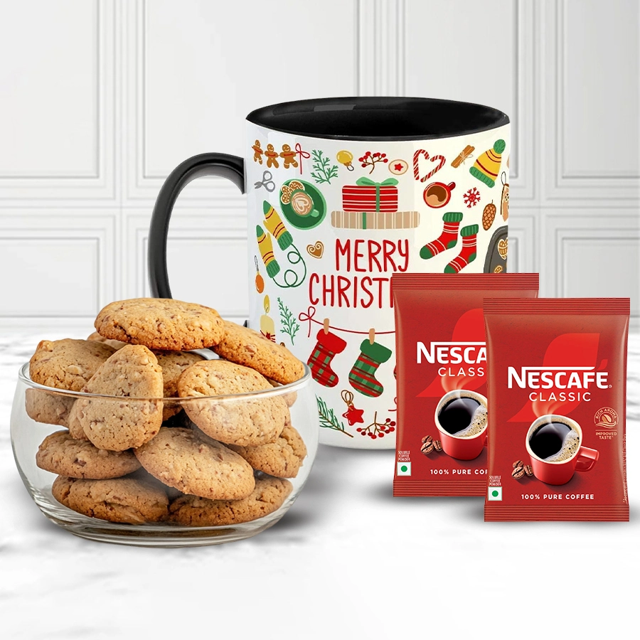 Personalized Christmas gift set with almond cookies, Nescafé coffee packs, and a "Merry Christmas" mug