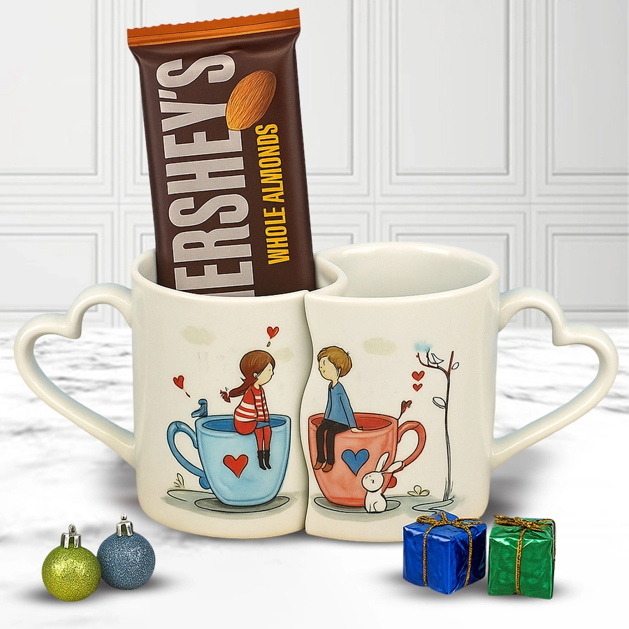 Personalized couple mug alongside a Hershey's Whole Almond Chocolate Bar, festive holiday setting.