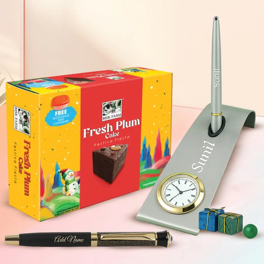 Gorgeous personalized desktop set featuring a plum cake, custom-engraved pen, elegant pen stand, and sleek clock.