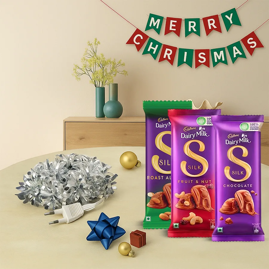 Crafty string lights and Merry Christmas banner gift set with Cadbury chocolates
