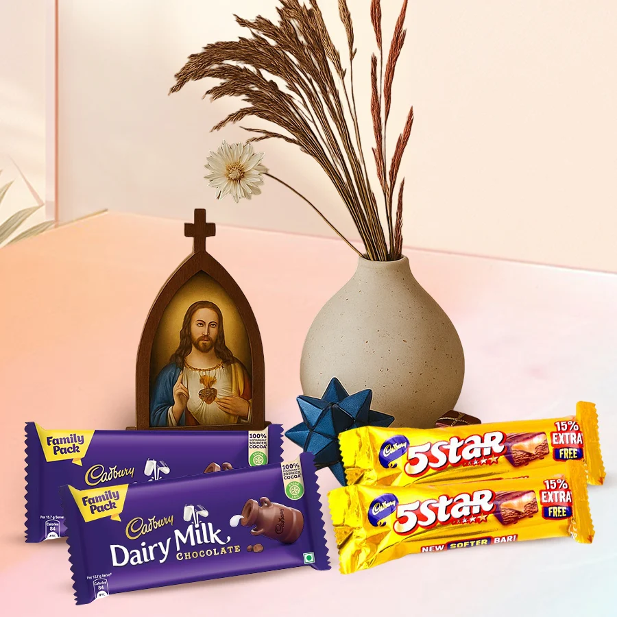 Holy Cross Statue Pendant alongside Cadbury Dairy Milk and 5 Star chocolate bars in an elegant gift set.