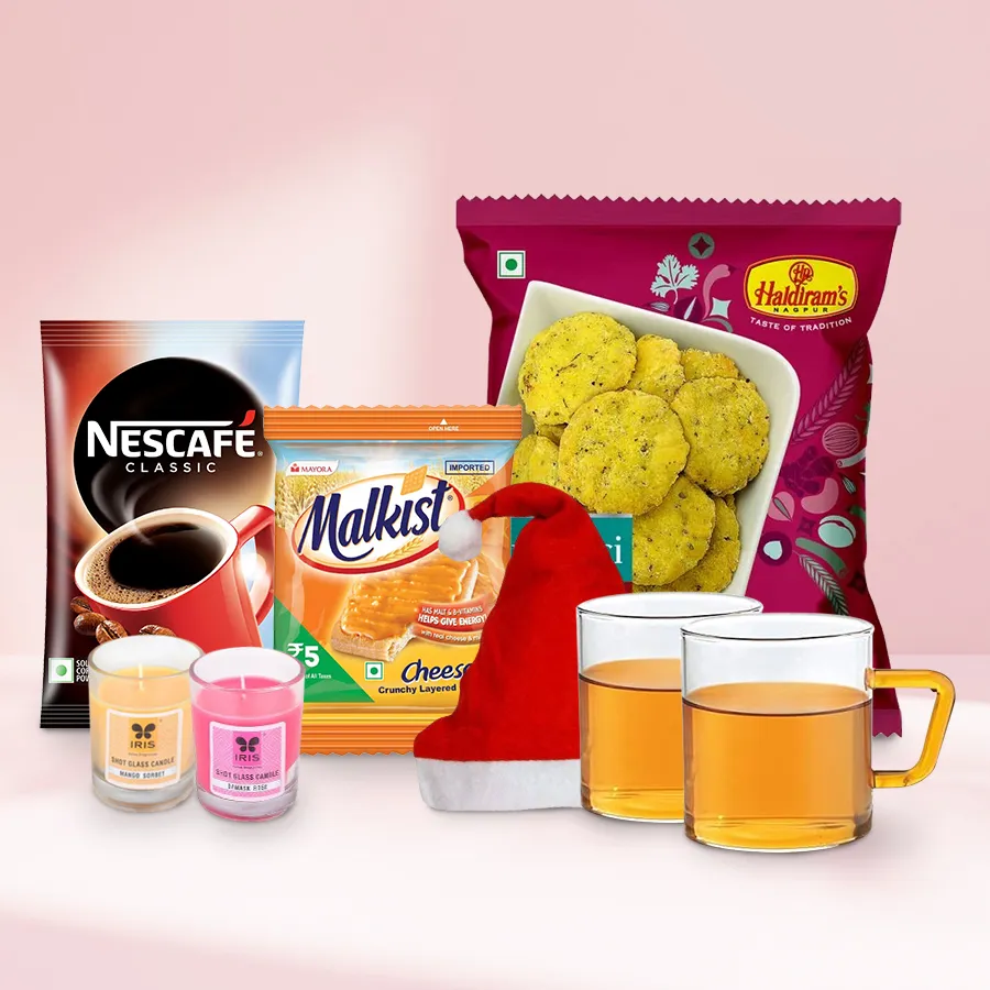 Splendid Christmas Coffee Time Hamper featuring coffee, snacks, mugs, candles, and a Christmas cap