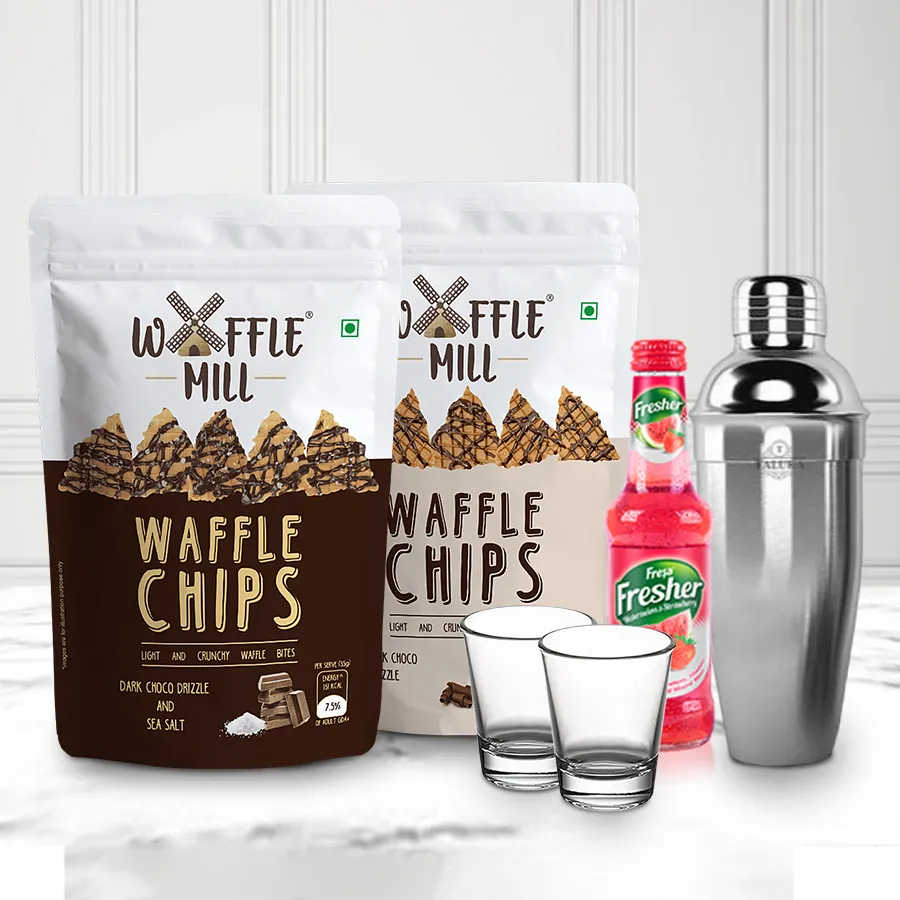 Terrific Christmas Hamper featuring Waffle Chips, Watermelon Strawberry Mocktail Mix, Stainless Steel Cocktail Shaker, and Shot Glasses