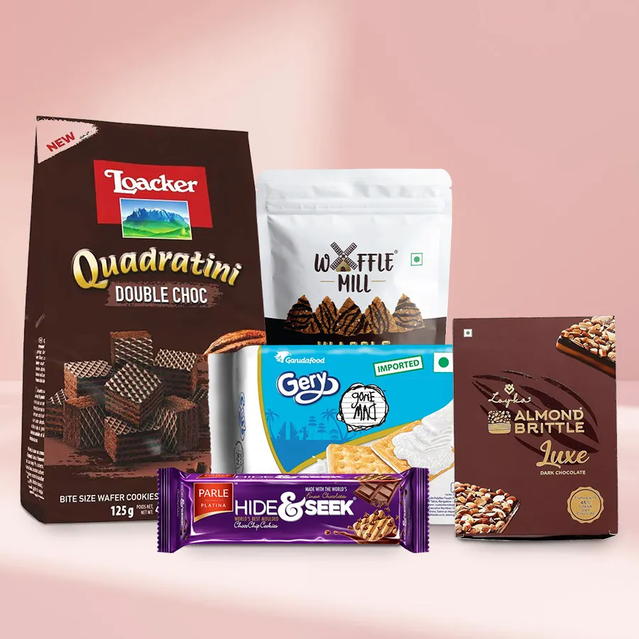 Christmas gift hamper filled with Scrumptous Waffers, Waffles, Cookies, and Crackers, including Double Choco Wafer Cookies, Choco-Chip Biscuits, Coconut Cream Crackers, Almond Brittle Pralines, and Waffle Chocolate Chips.