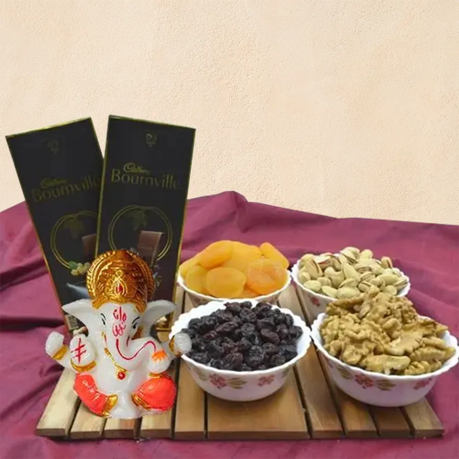 Charming Marble Ganpati idol with Bournville chocolate and assorted dry fruits in an elegant gift hamper