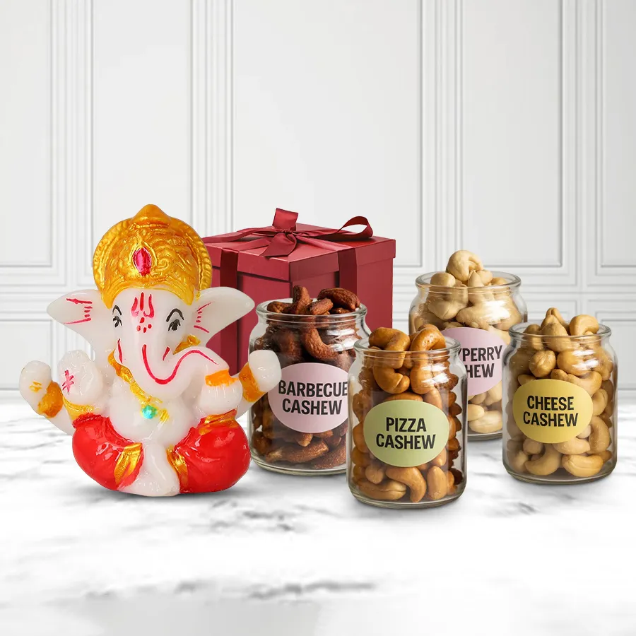 Superb Marble Ganesha idol with flavored cashews gift combo in an elegant box