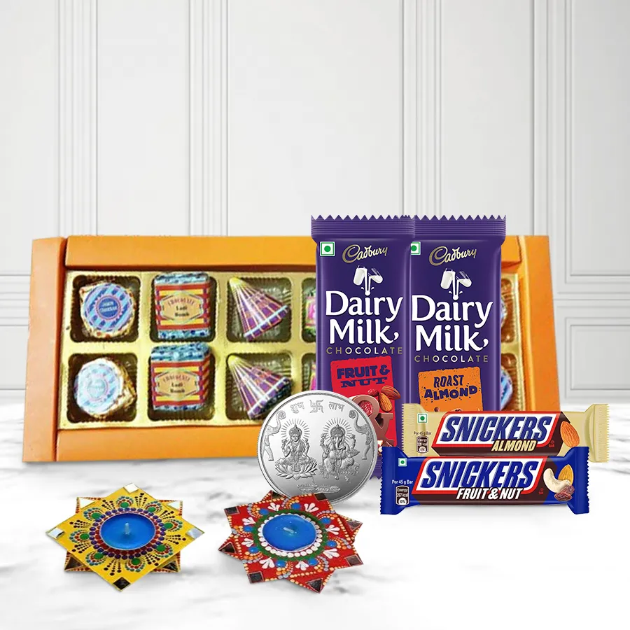 Fabulous Diwali gift hamper featuring handmade chocolates, Dot Mandala Diyas, and a Ganesh Lakshmi coin in an elegant gift box.