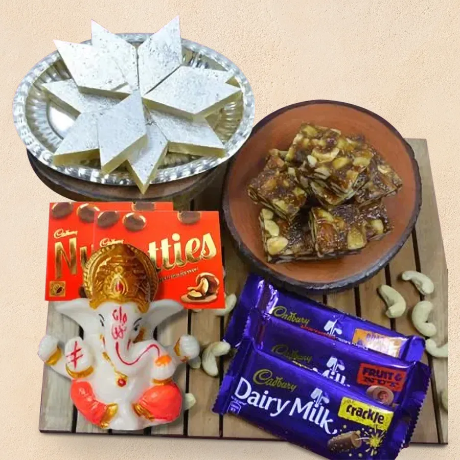 Exclusive Marble Ganesha idol with Cadbury chocolates and Haldiram sweets gift combo