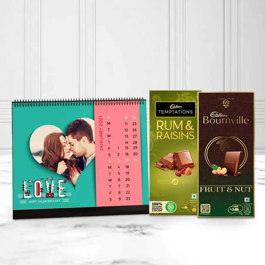 Personalized desk calendar with custom photos and Cadbury chocolate duo box featuring Rum & Raisin and Fruit & Nut Dark Chocolate.