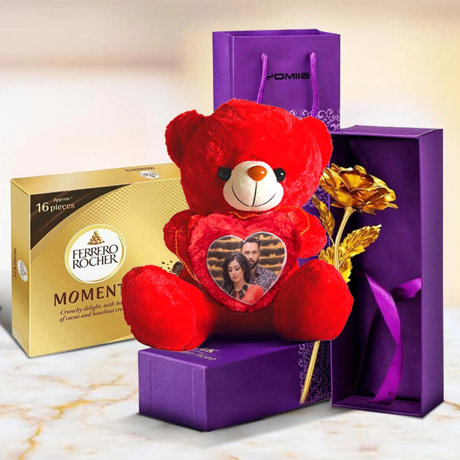 Personalized teddy bear with heart-shaped handle, golden rose, and box of Ferrero Rocher Moments