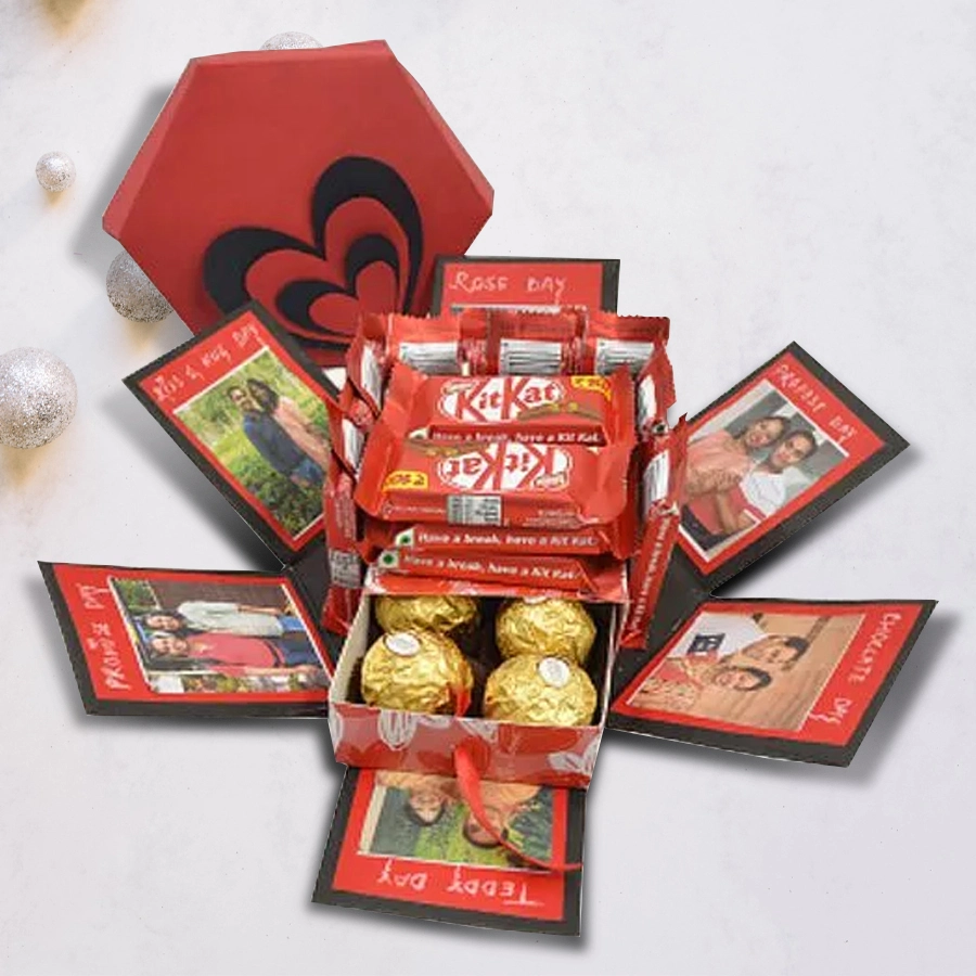 Hexagonal explosion box filled with Ferrero Rocher and Nestle Kitkats, personalized with photos and messages