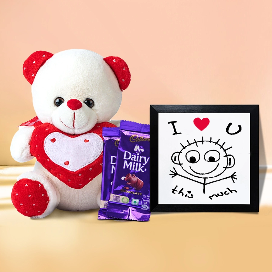ILU tabletop display with a red and white teddy bear and Cadbury Dairy Milk chocolate bars for Valentine's Day gift set