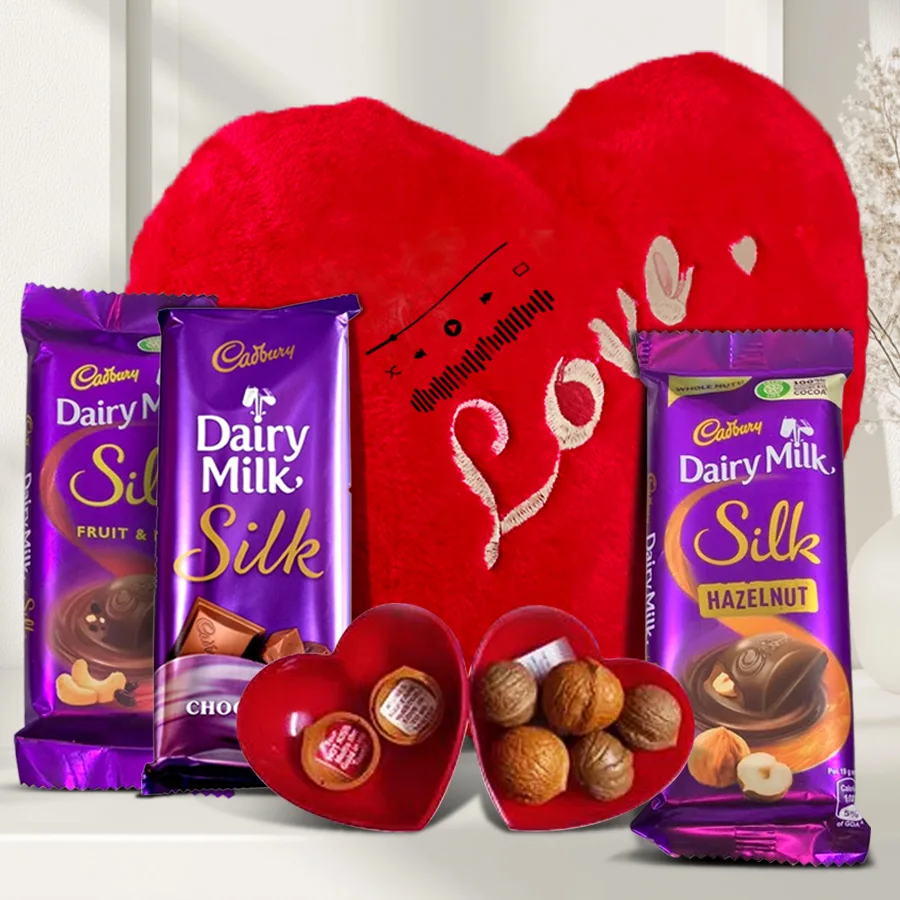 Musical heart-shaped cushion with Cadbury Dairy Milk Silk bars and a personalized love message box