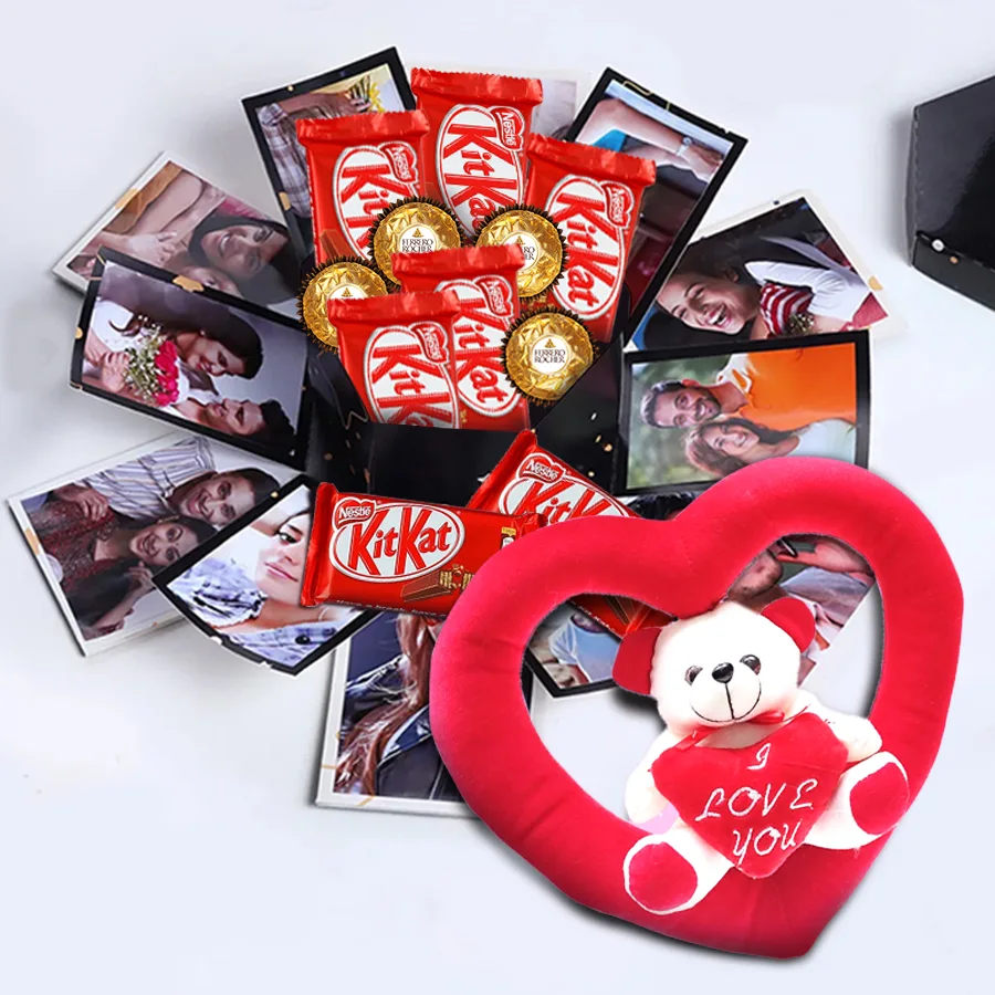 Personalized hexagon explosion box filled with Ferrero Rocher, Kit Kat chocolates, a teddy heart, and custom photos or messages.