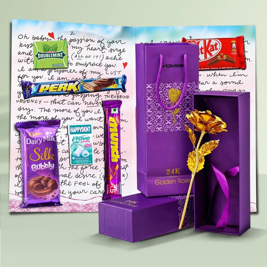 Mixed chocolates with a personalized chocolate message card and a golden rose in an elegant gift set.