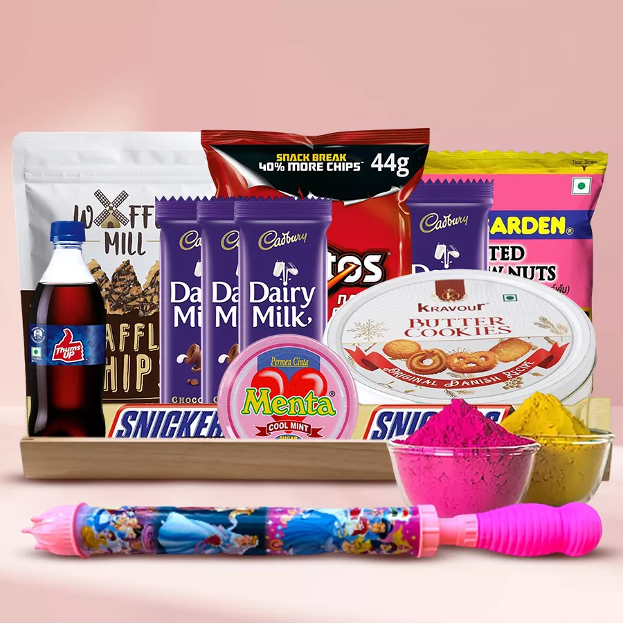 A colorful Holi celebration hamper featuring gourmet treats, a long pitchkari, and herbal gulal in a reusable wooden tray.
