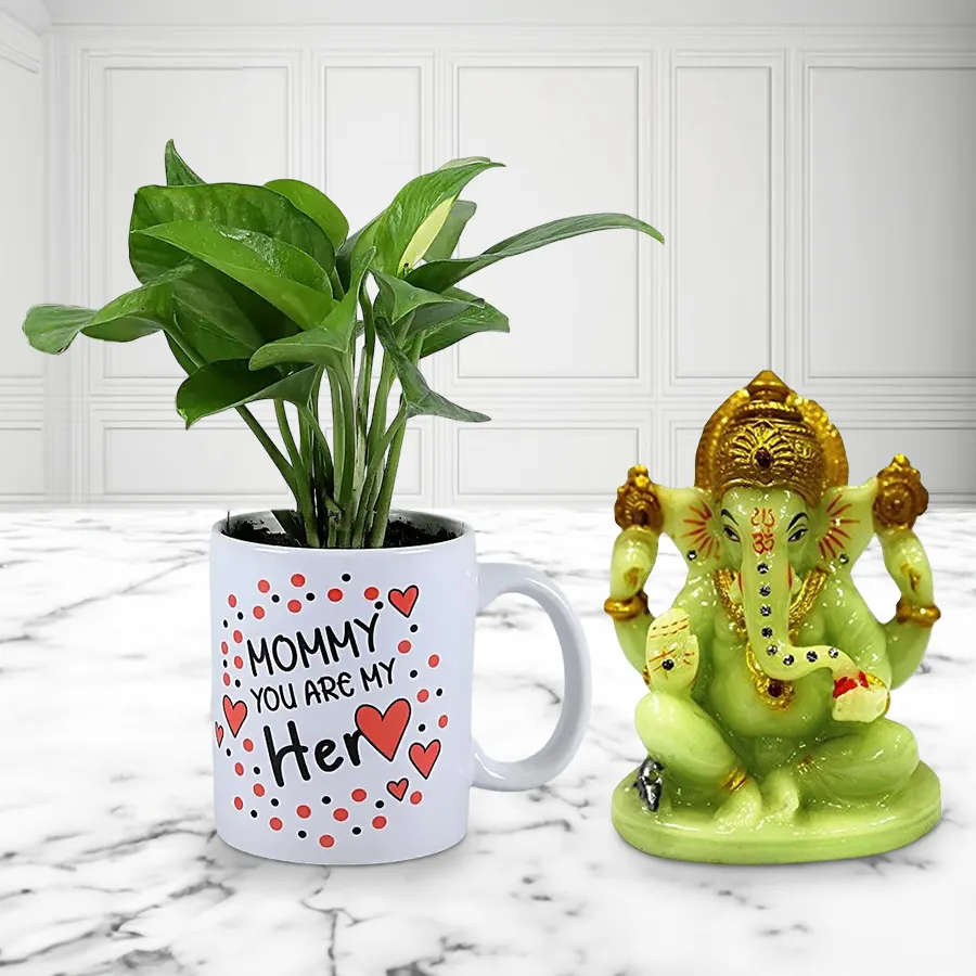 Mug featuring a Money Plant and a glowing Ganesh idol, perfect for Mother's Day gift.