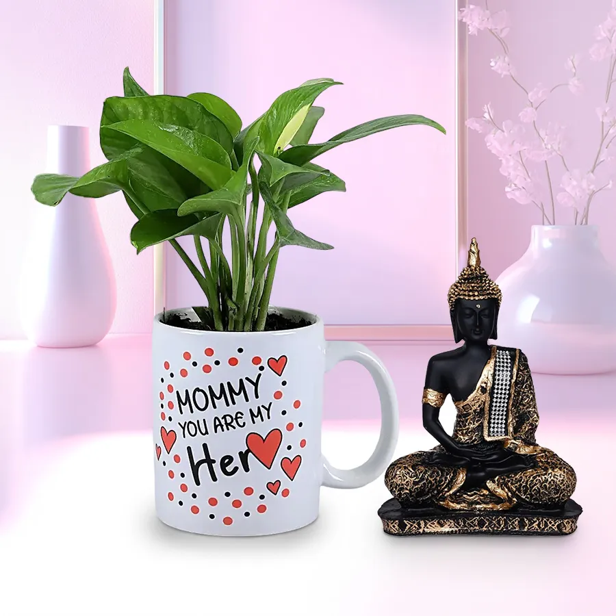 Splendid Money Plant in a mug next to a Gautam Buddha idol, designed as a heartfelt Mother's Day gift.
