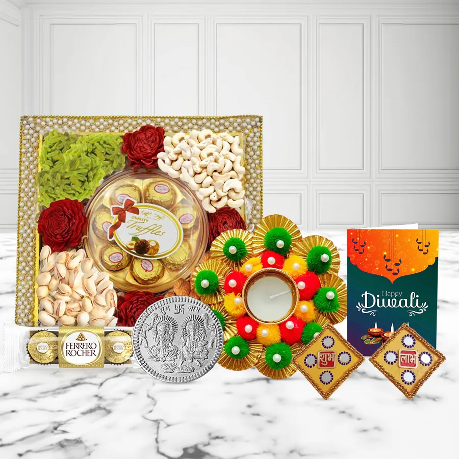 Complete Diwali Wishes Gift Hamper with pearl-decorated tray, premium nuts, chocolates, diya, wall sticker set, silver-plated coin, and personalized card.