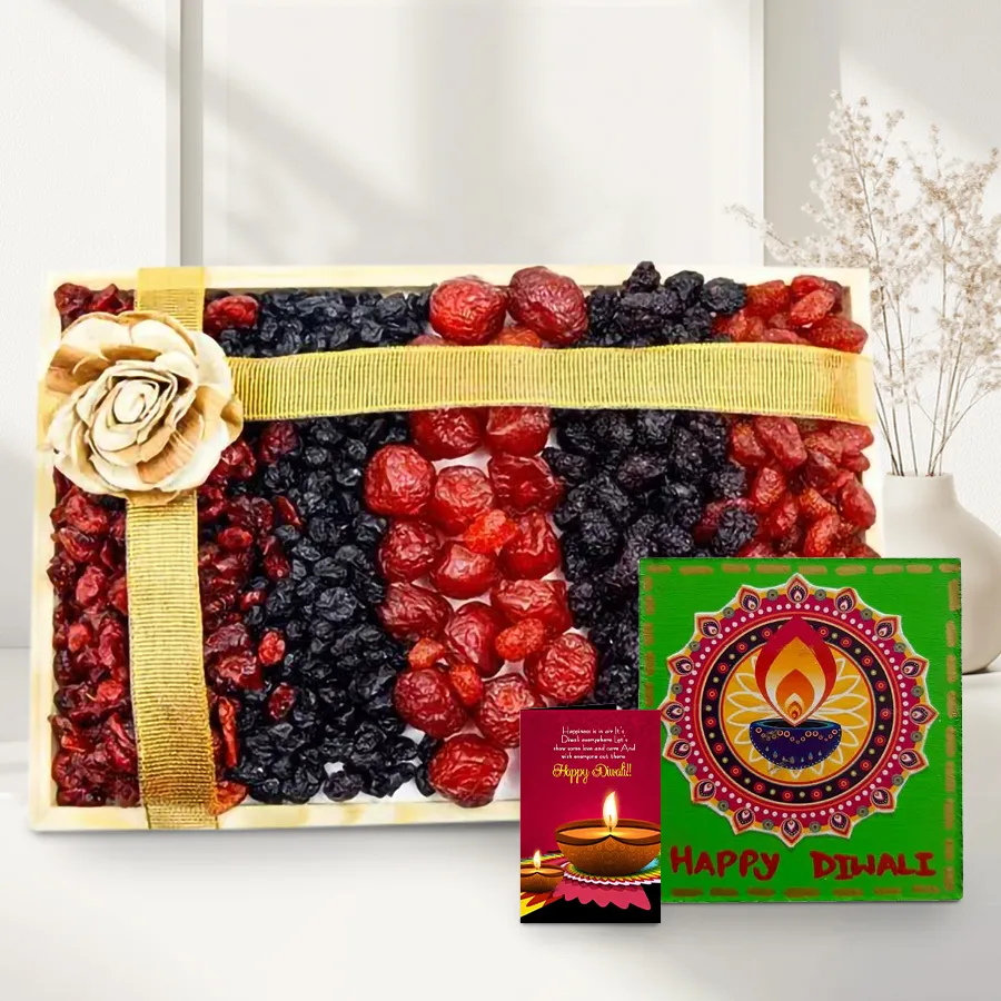 Festive Special Dry Fruits Tray with assorted berries, a handmade Happy Diwali fridge magnet, and a greetings card on a wooden tray.
