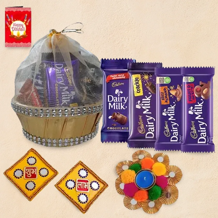 Mast Diwali Hamper featuring assorted Cadbury chocolates, a Shubh Labh wall sticker, and an elegant tea light candle holder in a decorative gift basket