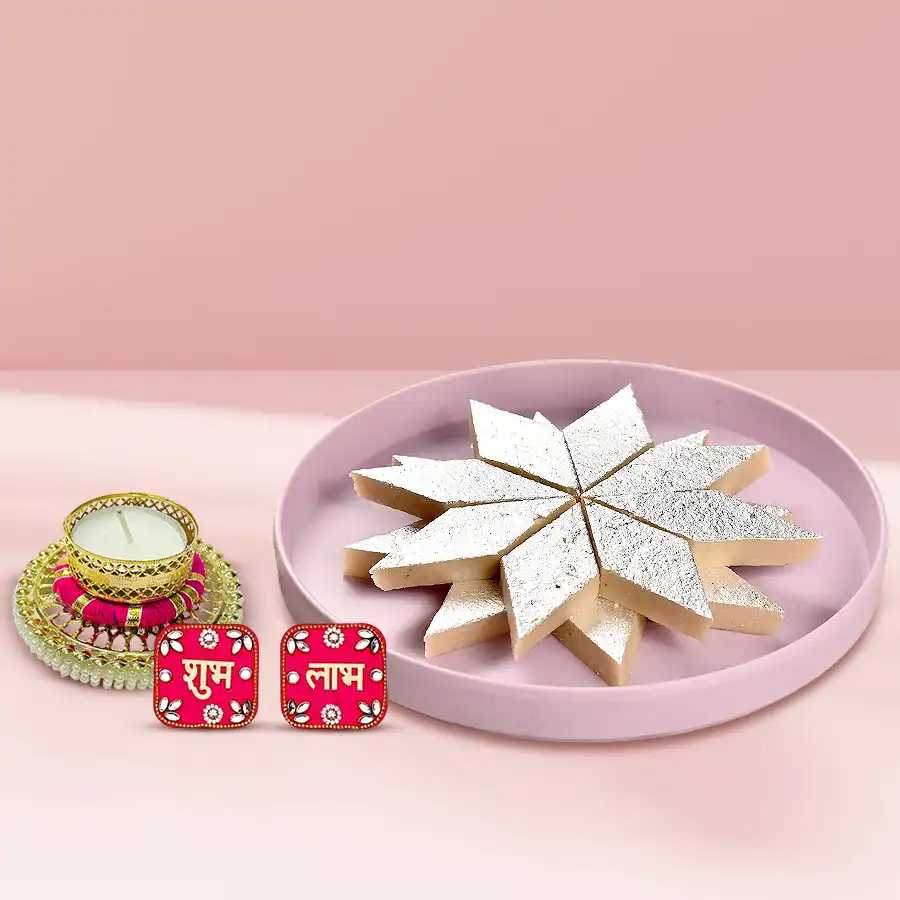 Diwali Dhamaka Kaju Sweets and Fancy Tea Lights combo showcasing Kaju Katli, Shubh Labh Wall Sticker, and elegant Tea Light Candle Holder arranged for festive celebration.