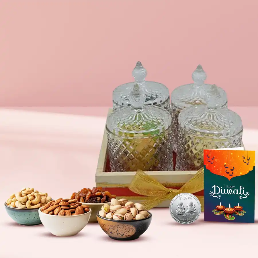 Mini Diwali Celebration Gift Hamper with wooden tray, designer glass jars filled with nuts, silver-plated Ganesh Laxmi coin, and Diwali greeting card