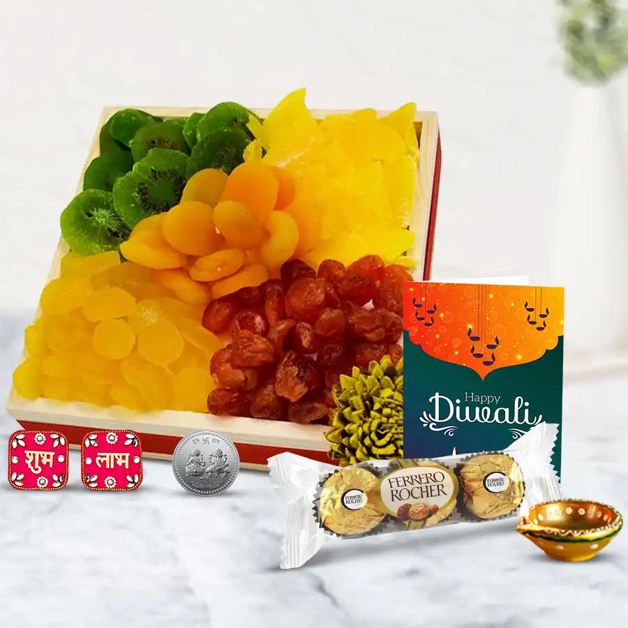 Graceful Collection Diwali Gifts Tray featuring a wooden tray filled with dried fruits, Ferrero Rocher chocolates, a diya, Shubh Labh wall stickers, a silver-plated coin, and a personalized greeting card